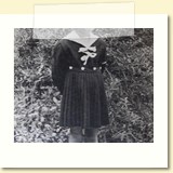 6 years old and in 1st grade in school uniform